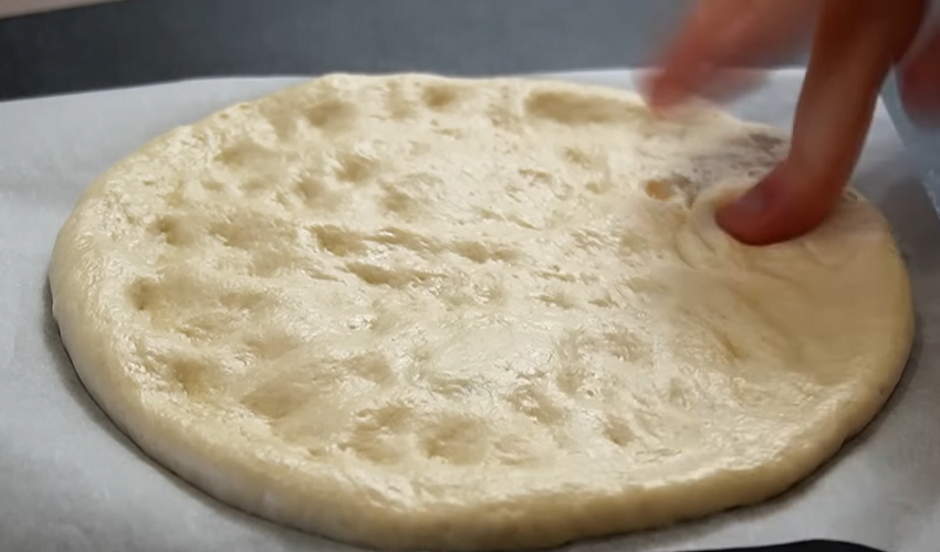 using your hands in a 7 8 inch pizza circle